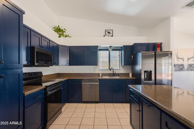 kitchen featuring a sink, light tile patterned floors, visible vents, stainless steel appliances, and blue cabinets