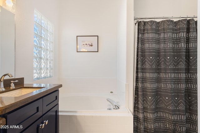 bathroom with a bath, curtained shower, and vanity