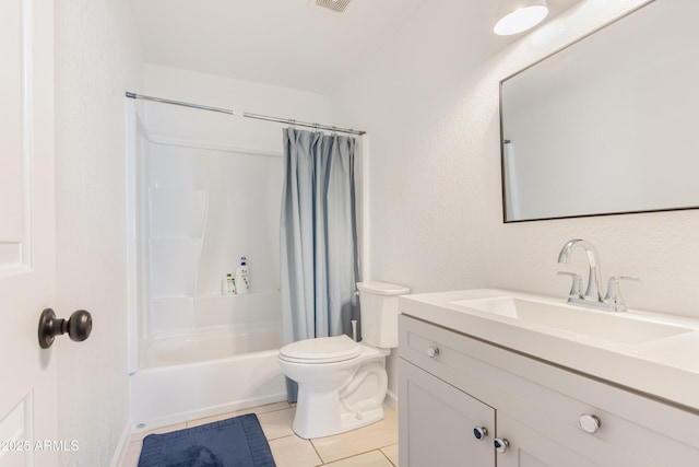 bathroom featuring vanity, baseboards, tile patterned flooring, toilet, and shower / bath combo with shower curtain