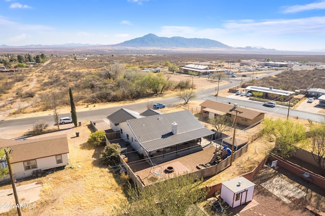 bird's eye view with a mountain view and view of desert
