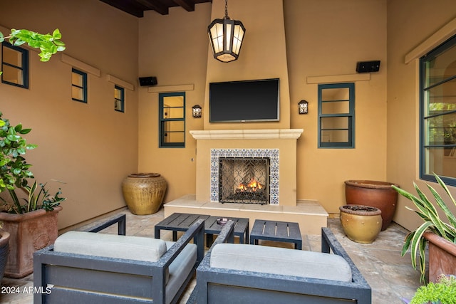 view of patio featuring a tile fireplace