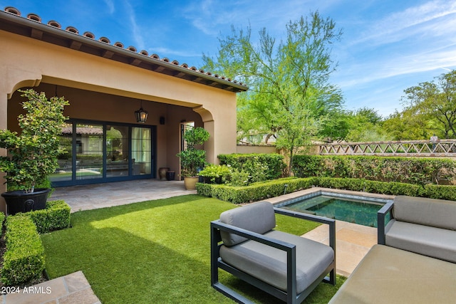 view of patio / terrace featuring a fenced backyard and a swimming pool