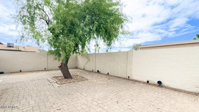 view of patio with a fenced backyard