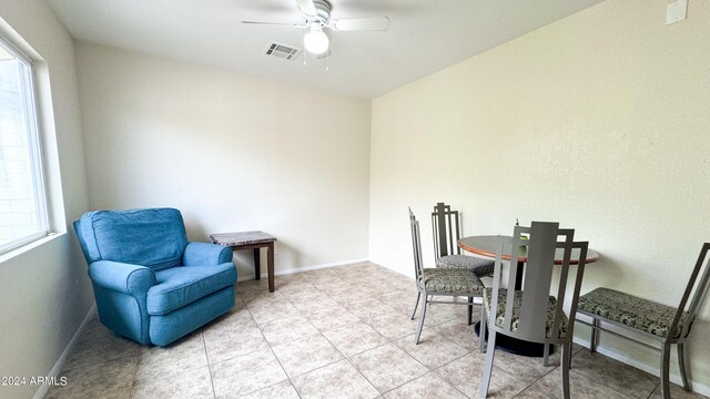 interior space with visible vents, plenty of natural light, and baseboards