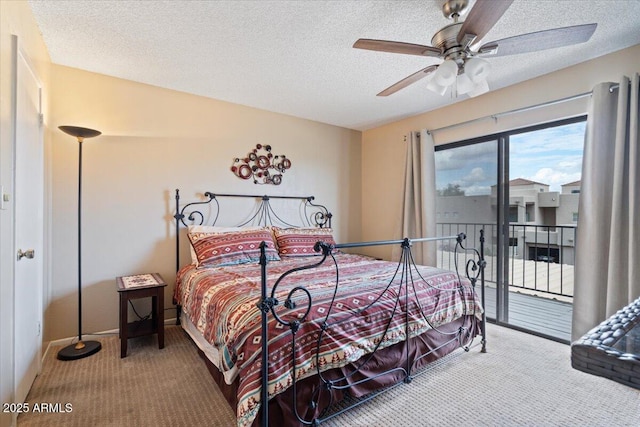16510 E Palisades Blvd Unit 42, Fountain Hills, AZ 85268 - bedroom featuring access to outside, carpet flooring, a textured ceiling, and a ceiling fan