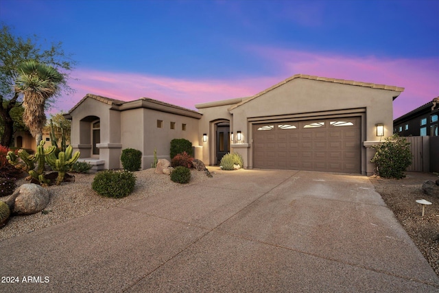 view of front of house with a garage