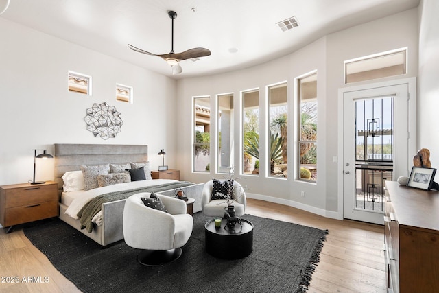 34599 N 99th Way, Scottsdale, AZ 85262 - bedroom featuring light wood finished floors, access to outside, baseboards, and a ceiling fan