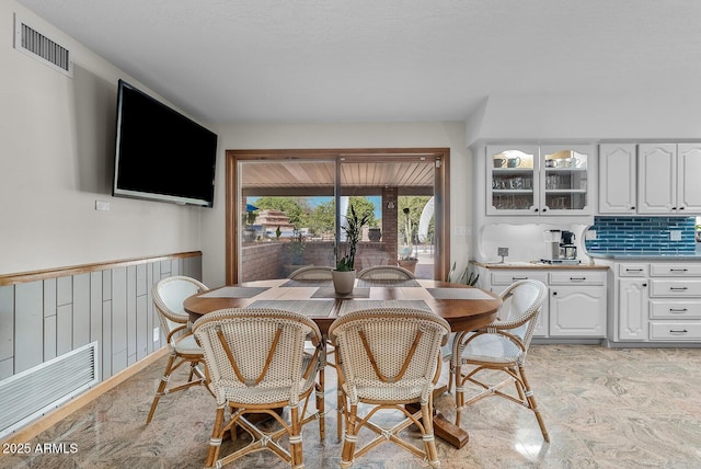 dining room with visible vents