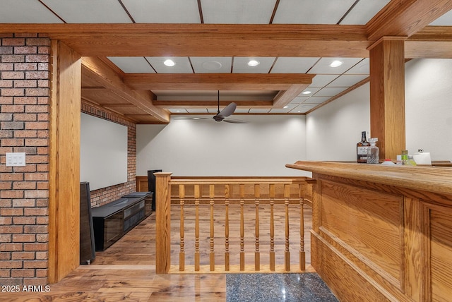 bar with recessed lighting, ceiling fan, a dry bar, and wood finished floors