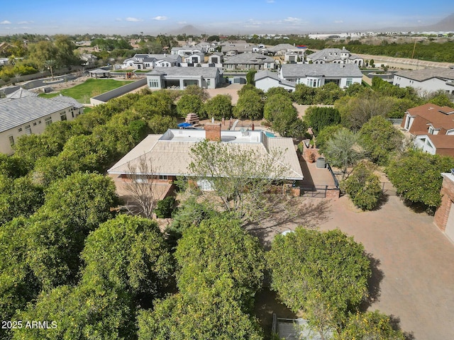 birds eye view of property with a residential view