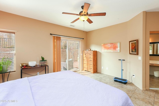 tiled bedroom featuring multiple windows, access to outside, and ceiling fan