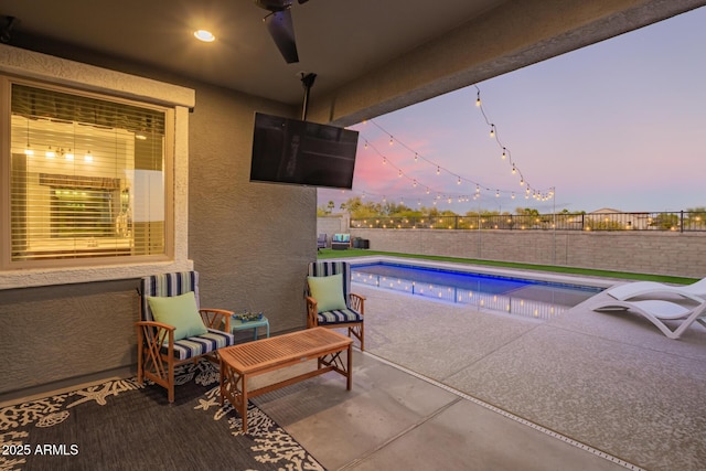 28883 N 131st Dr, Peoria, AZ 85383 - view of pool featuring a patio area, a fenced backyard, a ceiling fan, and a fenced in pool