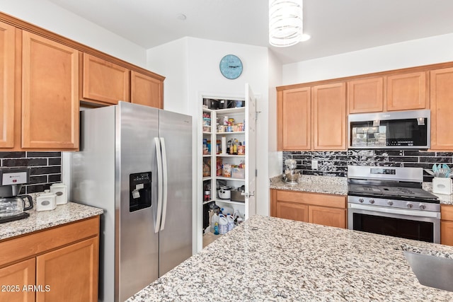 28883 N 131st Dr, Peoria, AZ 85383 - kitchen featuring stainless steel appliances and light stone countertops
