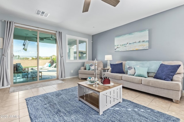 28883 N 131st Dr, Peoria, AZ 85383 - living area with baseboards, light tile patterned flooring, visible vents, and a ceiling fan