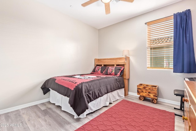 28883 N 131st Dr, Peoria, AZ 85383 - bedroom featuring light wood-type flooring, ceiling fan, and baseboards