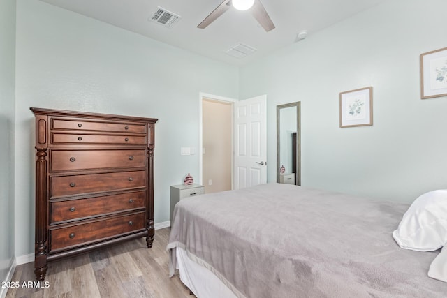 28883 N 131st Dr, Peoria, AZ 85383 - bedroom featuring light wood-type flooring, baseboards, visible vents, and a ceiling fan