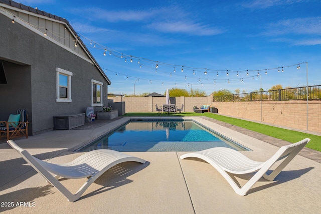 28883 N 131st Dr, Peoria, AZ 85383 - view of swimming pool featuring a patio area, a fenced backyard, and a fenced in pool