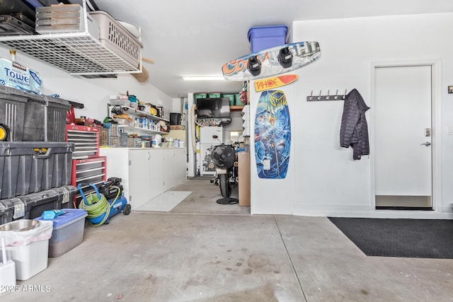 28883 N 131st Dr, Peoria, AZ 85383 - garage featuring a workshop area