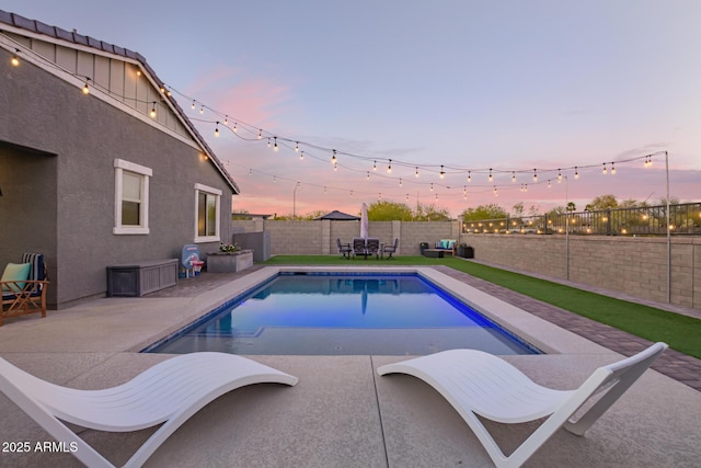 28883 N 131st Dr, Peoria, AZ 85383 - view of swimming pool featuring a patio area, a fenced backyard, and a fenced in pool