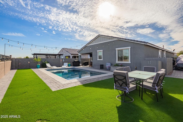 28883 N 131st Dr, Peoria, AZ 85383 - view of pool featuring a lawn, a patio area, a fenced backyard, and a fenced in pool