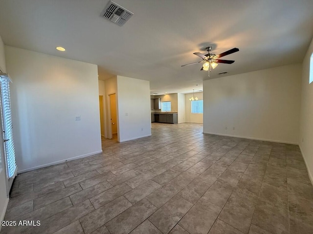 interior space with ceiling fan