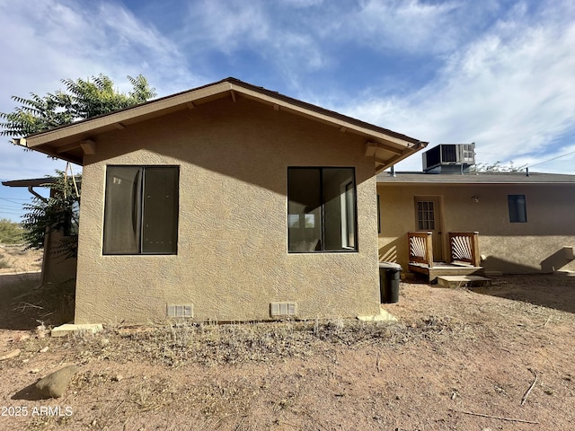 414 W Frontier St Unit A, Payson, AZ 85541 - view of side of home with stucco siding and central air condition unit