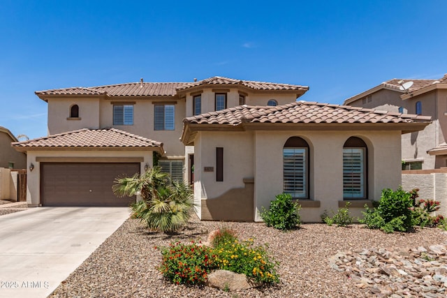 6870 S Crestview Dr, Gilbert, AZ 85298 - mediterranean / spanish home with stucco siding, a tiled roof, concrete driveway, an attached garage, and fence