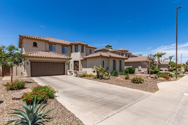 6870 S Crestview Dr, Gilbert, AZ 85298 - mediterranean / spanish-style home with stucco siding, driveway, a tile roof, and a garage