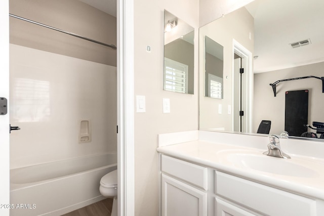 6870 S Crestview Dr, Gilbert, AZ 85298 - full bathroom with vanity, toilet, wood finished floors, and bathing tub / shower combination
