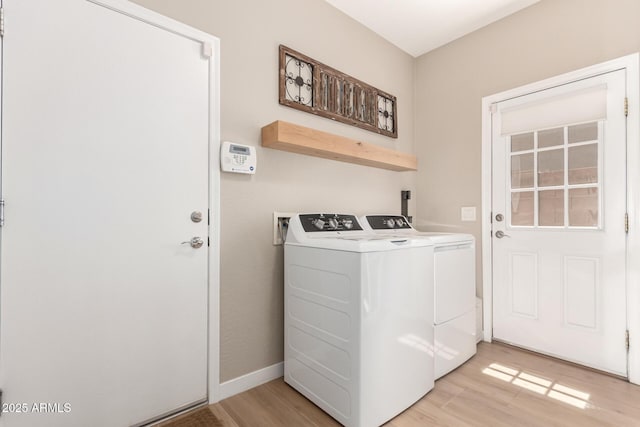 6870 S Crestview Dr, Gilbert, AZ 85298 - clothes washing area with washer and dryer, light wood finished floors, and baseboards