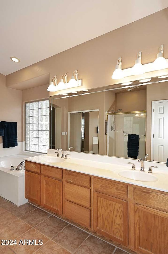 bathroom with separate shower and tub and vanity