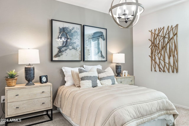 bedroom featuring baseboards, an inviting chandelier, and carpet floors