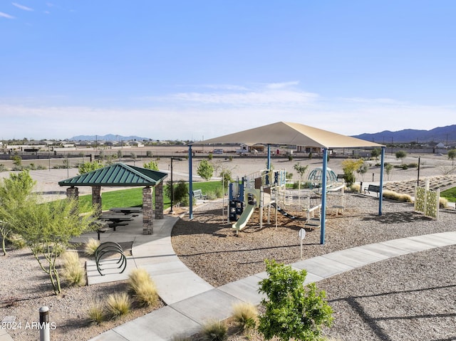 communal playground featuring a gazebo and a mountain view