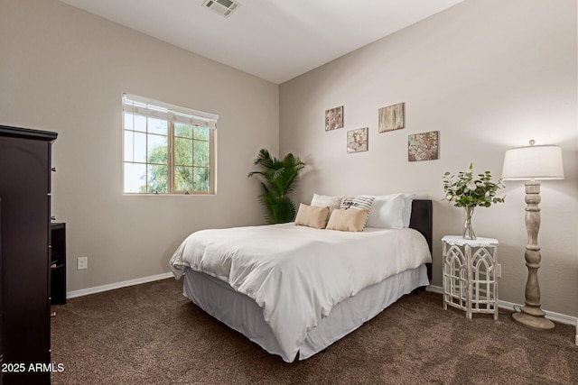 bedroom featuring visible vents, carpet flooring, and baseboards