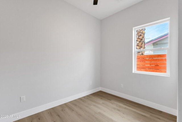 2122 W Virginia Ave, Phoenix, AZ 85009 - empty room featuring baseboards, light wood finished floors, and ceiling fan