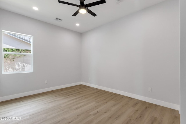 2122 W Virginia Ave, Phoenix, AZ 85009 - unfurnished room featuring ceiling fan, light wood-style flooring, baseboards, and recessed lighting