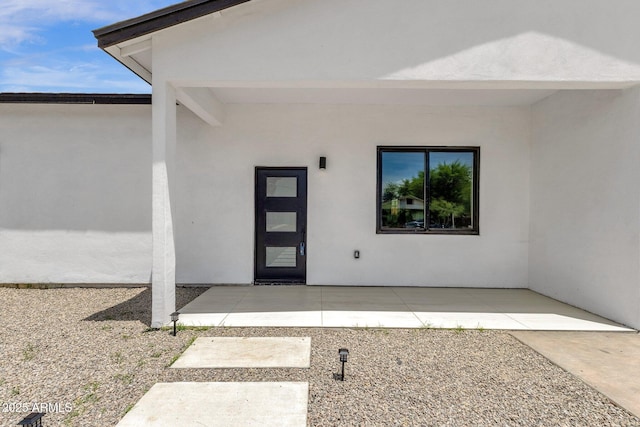 2122 W Virginia Ave, Phoenix, AZ 85009 - property entrance featuring stucco siding and a patio