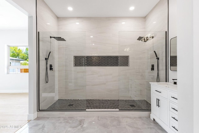 2122 W Virginia Ave, Phoenix, AZ 85009 - full bathroom featuring vanity, a tile shower, baseboards, recessed lighting, and marble finish flooring