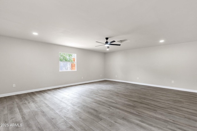 2122 W Virginia Ave, Phoenix, AZ 85009 - unfurnished room with recessed lighting, wood finished floors, baseboards, and ceiling fan