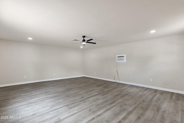 2122 W Virginia Ave, Phoenix, AZ 85009 - spare room featuring recessed lighting, baseboards, ceiling fan, and wood finished floors