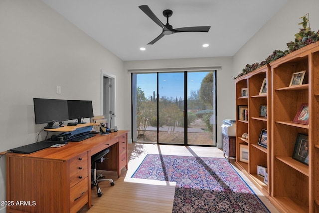 office with ceiling fan and light wood-type flooring