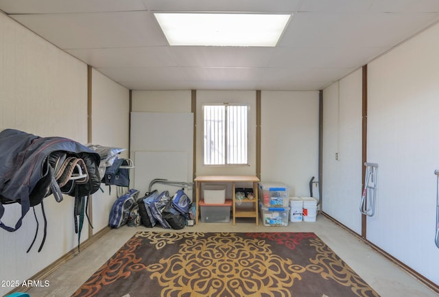 interior space featuring a drop ceiling