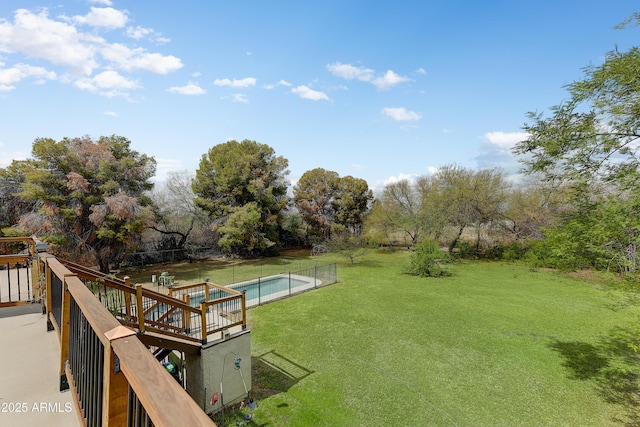 view of yard with an outdoor pool