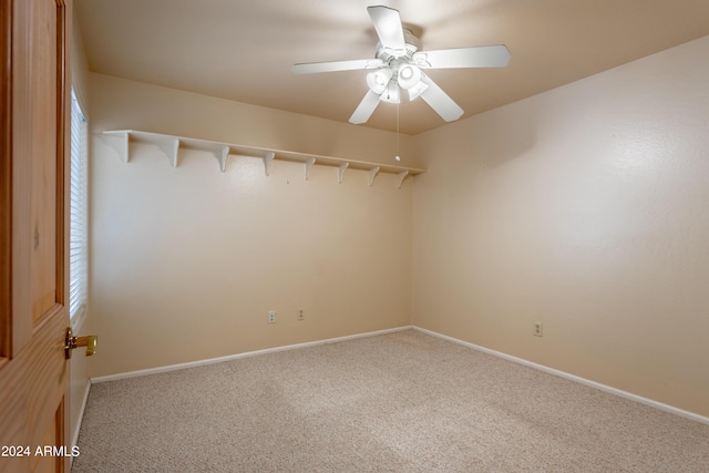 carpeted empty room with ceiling fan