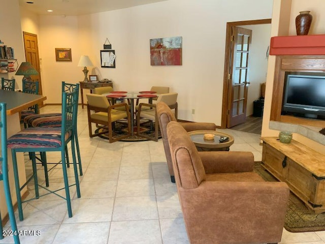 living room with light tile patterned floors