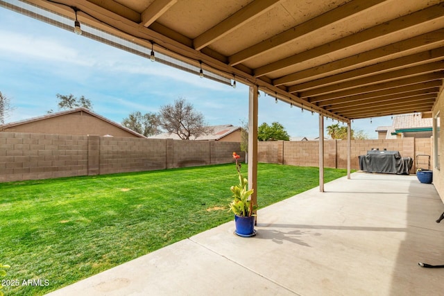 view of patio / terrace with a fenced backyard and grilling area