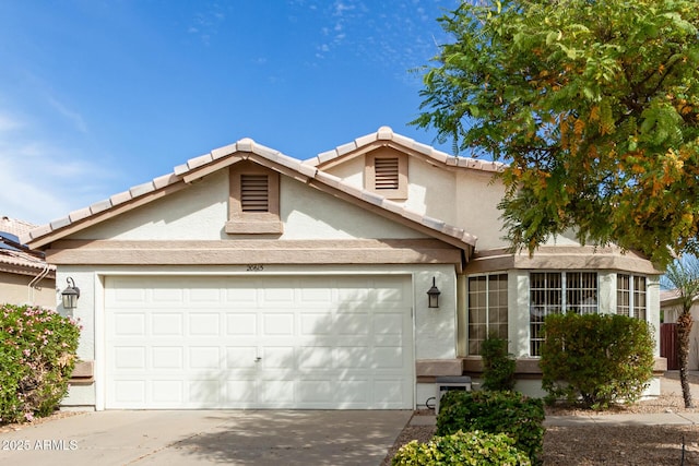 view of property featuring a garage