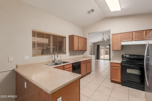 9243 W Brown St, Peoria, AZ 85345 - kitchen with black appliances, a sink, lofted ceiling, light tile patterned floors, and light countertops