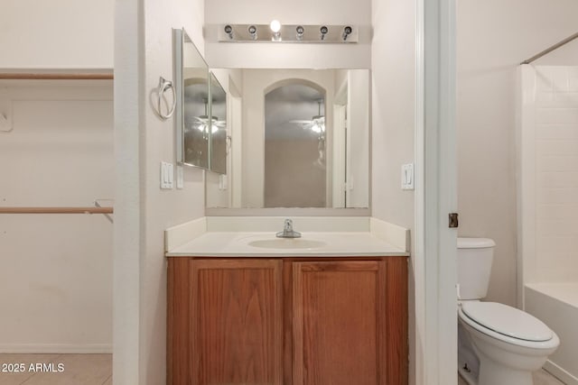 9243 W Brown St, Peoria, AZ 85345 - full bath featuring ceiling fan, vanity, toilet, tile patterned floors, and shower / tub combination