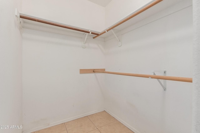 9243 W Brown St, Peoria, AZ 85345 - walk in closet with light tile patterned floors